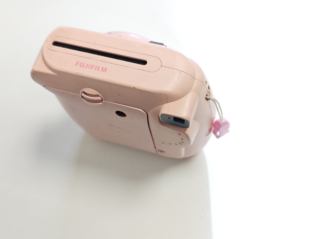 Fujifilm Instax Mini 8 rose non fonctionnel pour pièces détachées appareil photo
