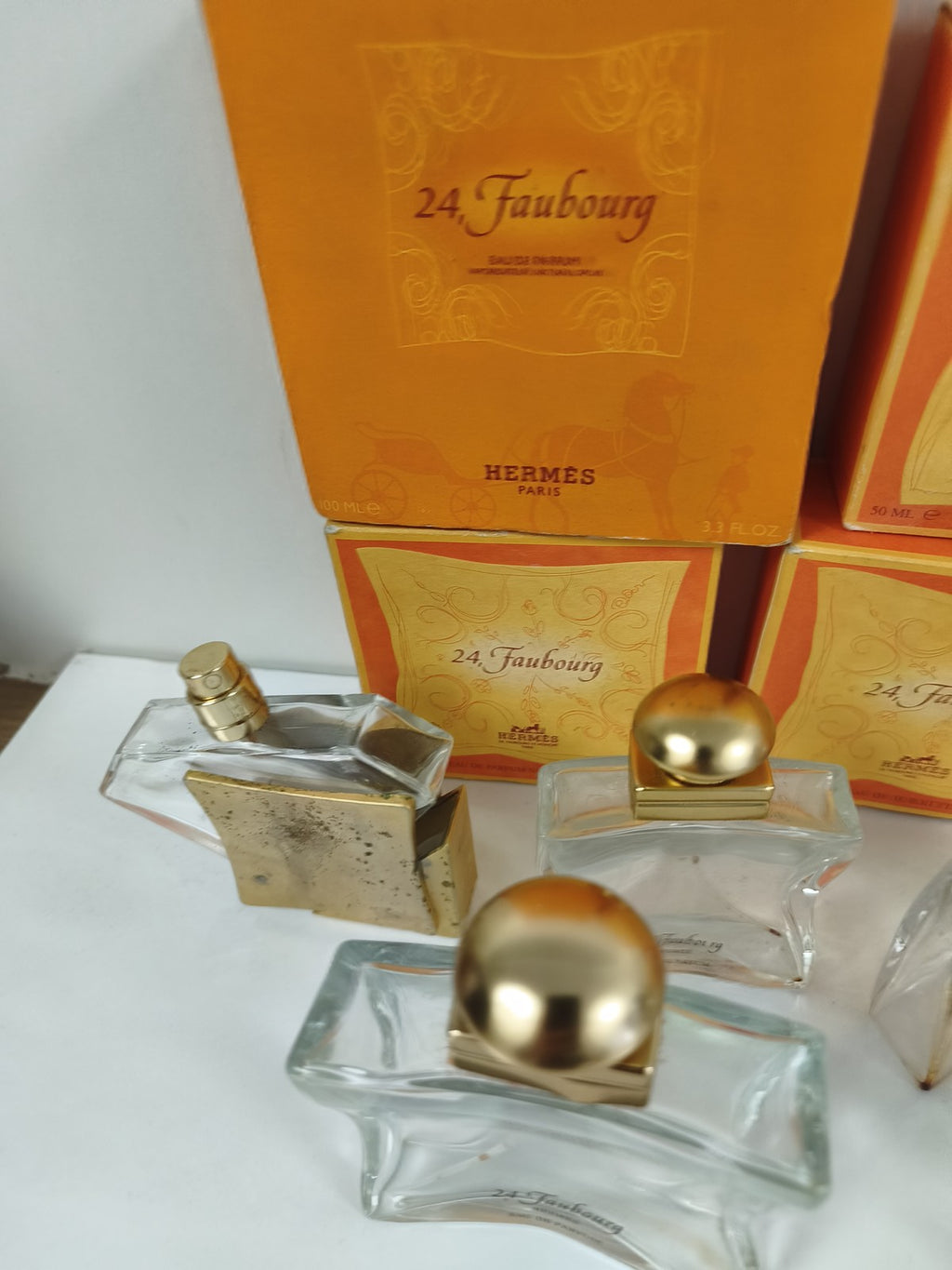 Gros lot flacons vides Hermès 24 Faubourg avec boîtes orange et doré