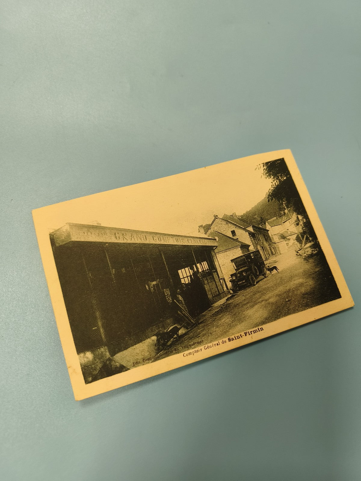 Ancienne carte postale animée Comptoir Général Saint-Firmin véhicule rétro