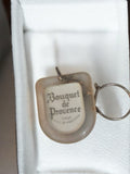 Porte-clés ancien Bouquet de Provence publicitaire rétro transparent vintage