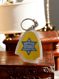 Porte-clés vintage Safran l’Étoile France publicitaire rétro jaune bleu