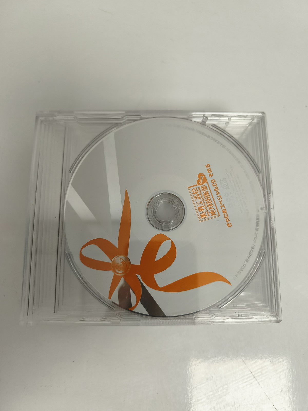 CD musique édition asiatique ruban orange boîtier cristal