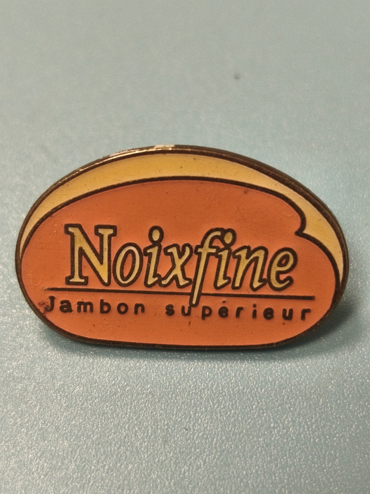 Vintage pin's publicitaire Noixfine jambon supérieur orange rétro collection