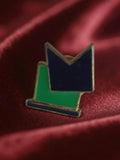 Pin's publicitaire ancien vintage forme géométrique bleu vert rétro