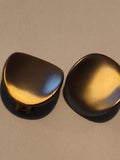 Paire boucles d’oreilles vintage bombées finition dorée clip rétro