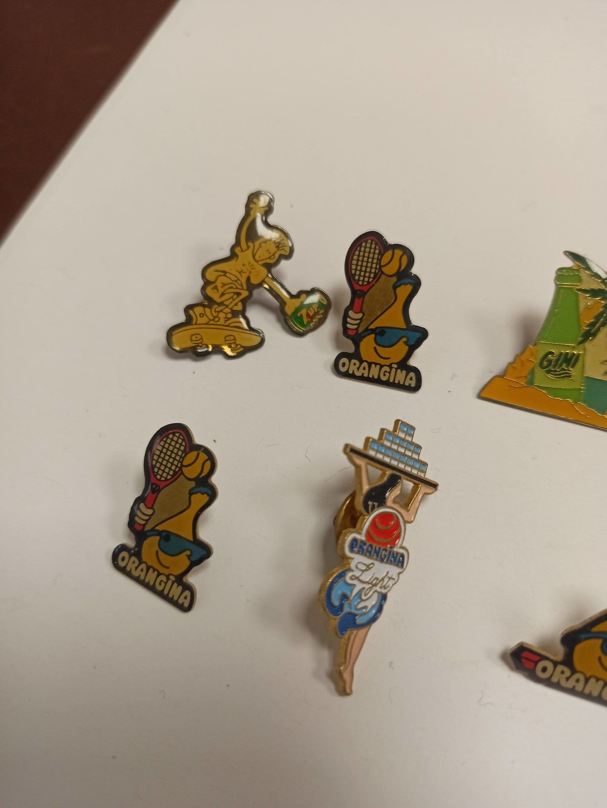 Lot 10 pin's Orangina vintage rétro années 80, publicitaires, mascottes