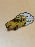 Pin's Citroën ZX Camel jaune rallye vintage, badge auto rétro années 90