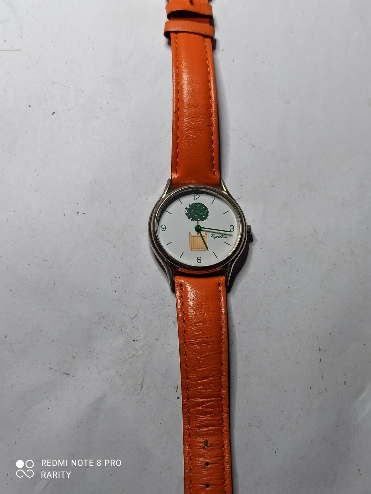 Montre femme Cyrillus vintage cadran décor arbre bracelet orange pile