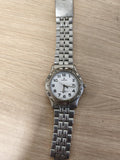 Montre Calypso homme bracelet métal argenté cadran blanc chiffres noirs étanche