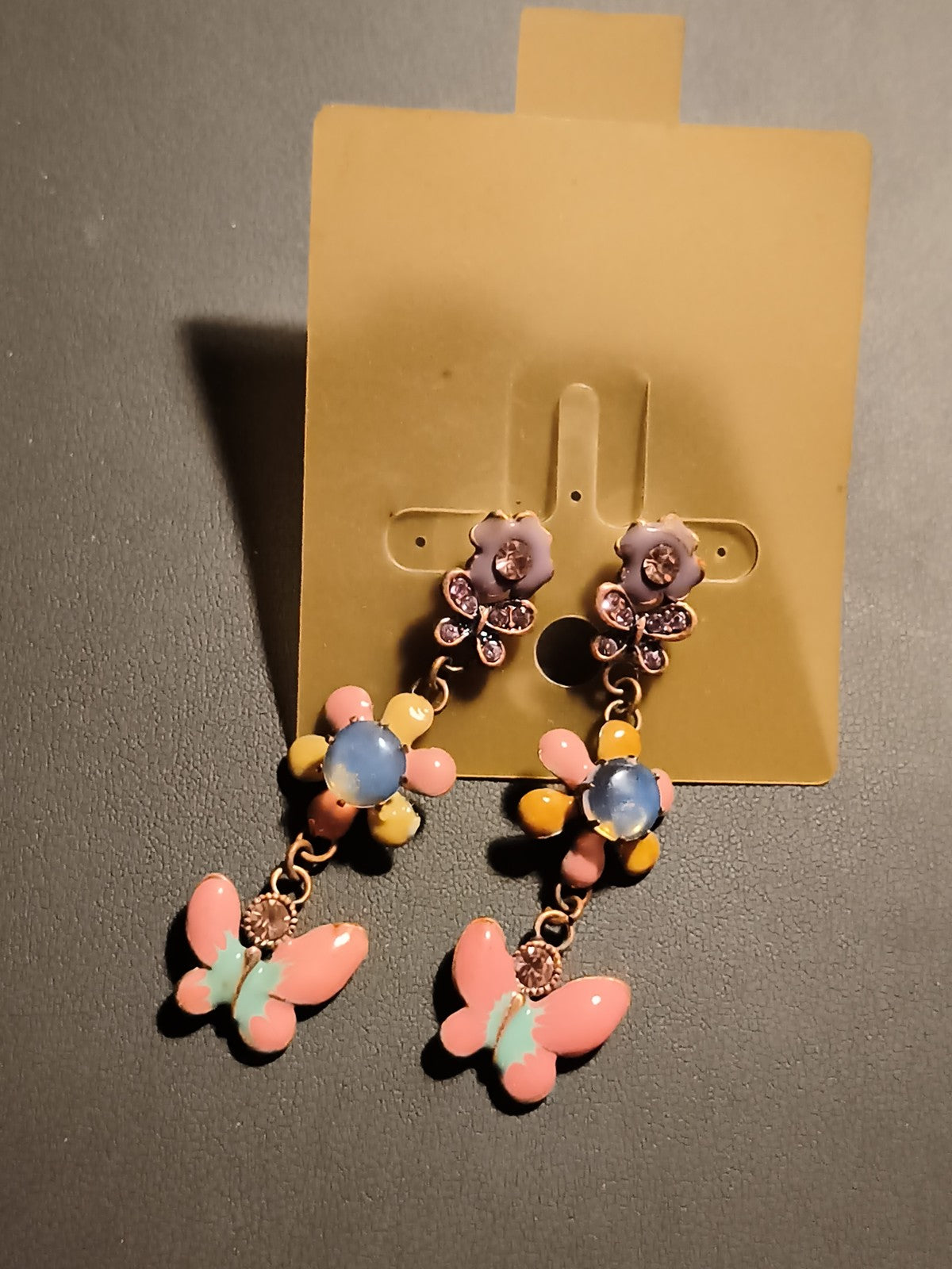 Paire boucles d’oreilles vintage pendantes fleurs papillon pastel deadstock