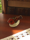 Pin's vintage Parfeu émail rouge blanc logo publicitaire rétro