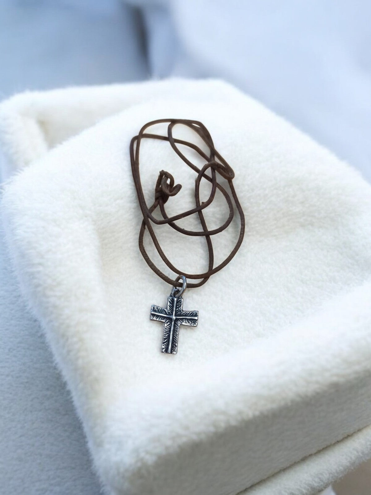 Vintage retro cross pendant necklace in silver tone on cord, antique jewelry