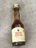 Mini bouteille Calvados Père Magloire Réserve de Gouberville 3cl partiellement r