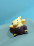 Figurine vintage Pokémon Soporifik jaune marron rétro années 90 ancien jouet