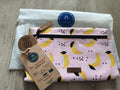 Pochette Cabaia motif bananes rose zip 24 cm neuve accessoires sac