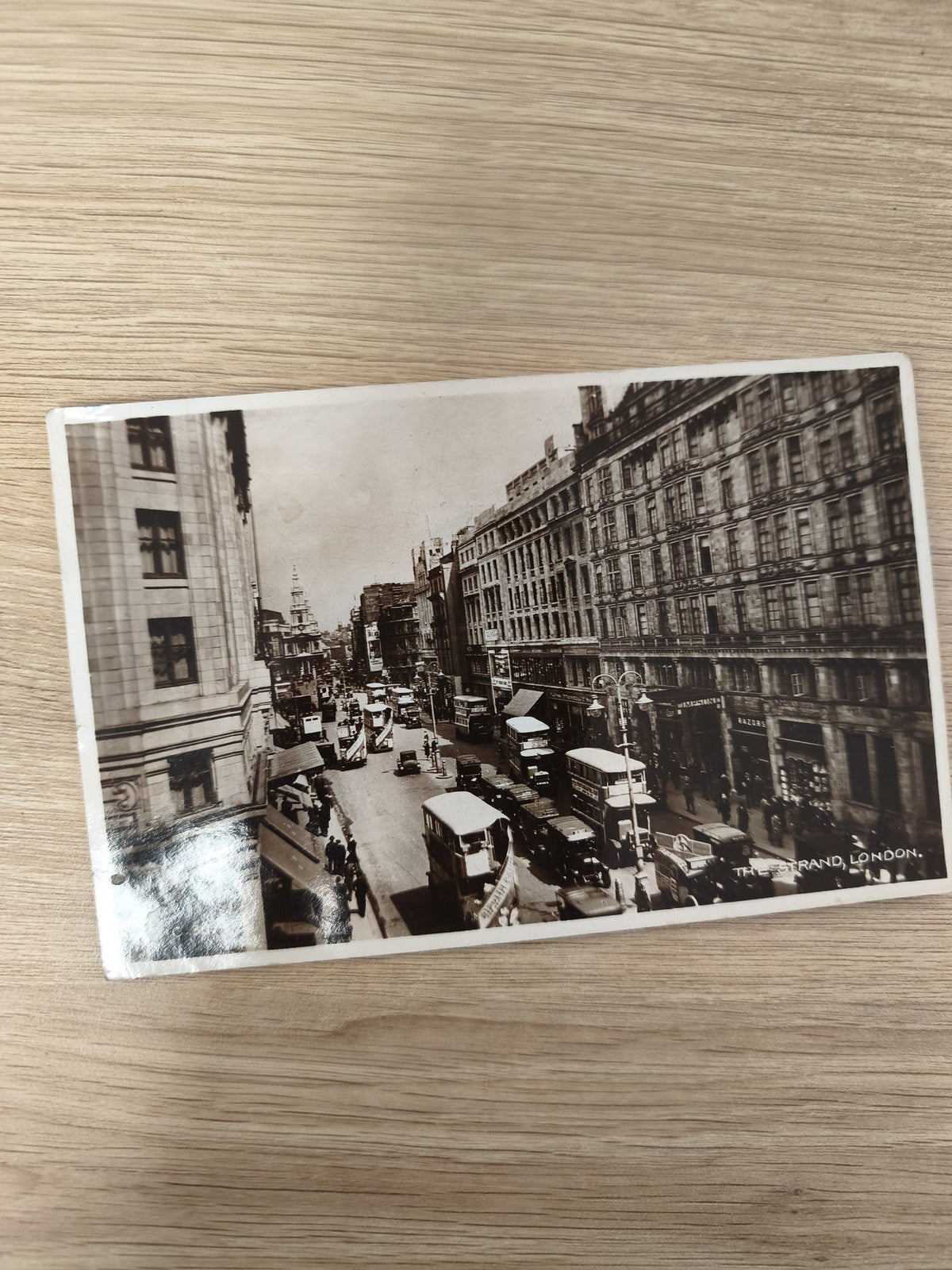 Ancienne carte postale CPA The Strand Londres vintage noir et blanc bus tramway