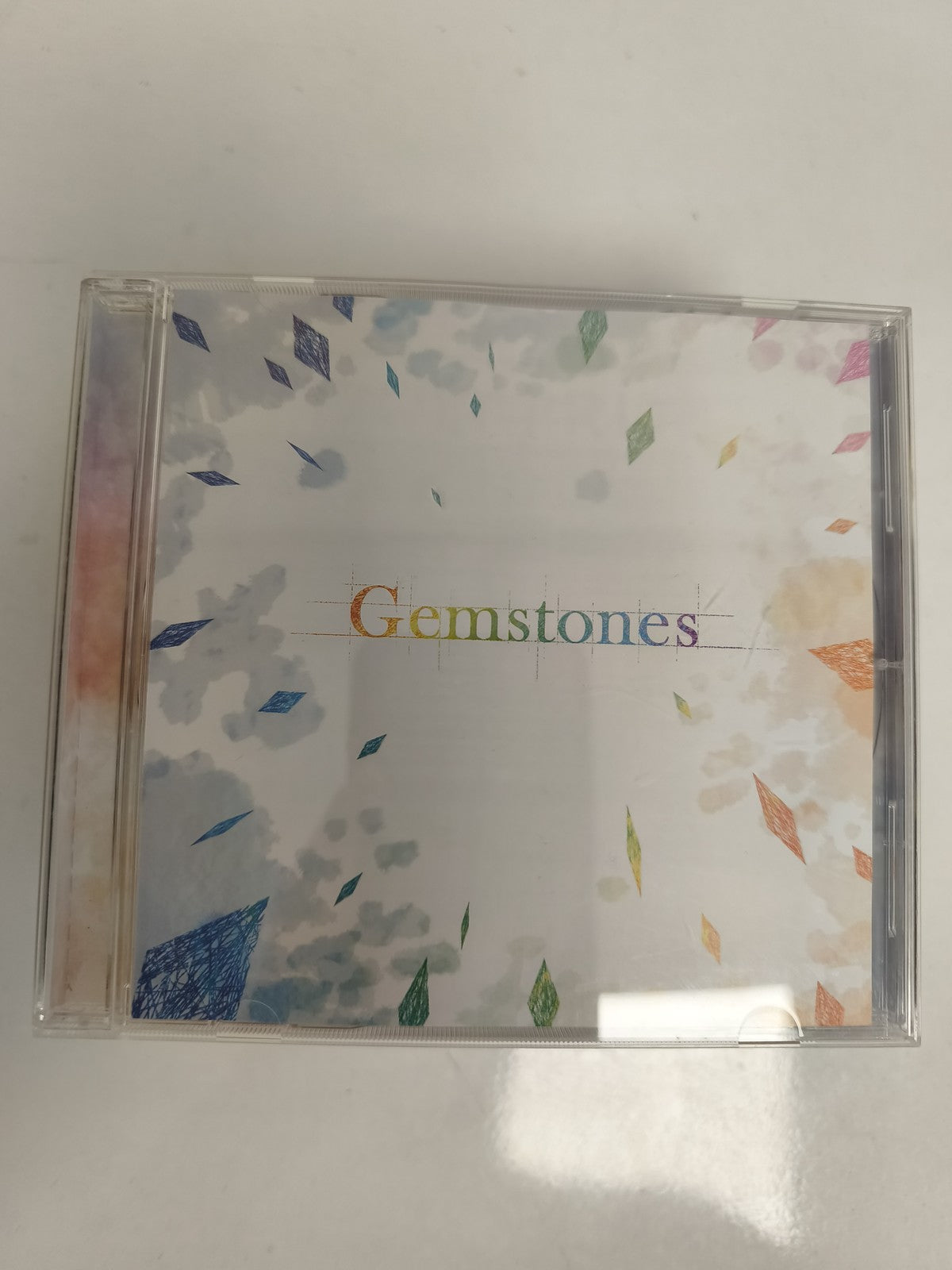 CD Gemstones musique pochette multicolore édition jewel case audio