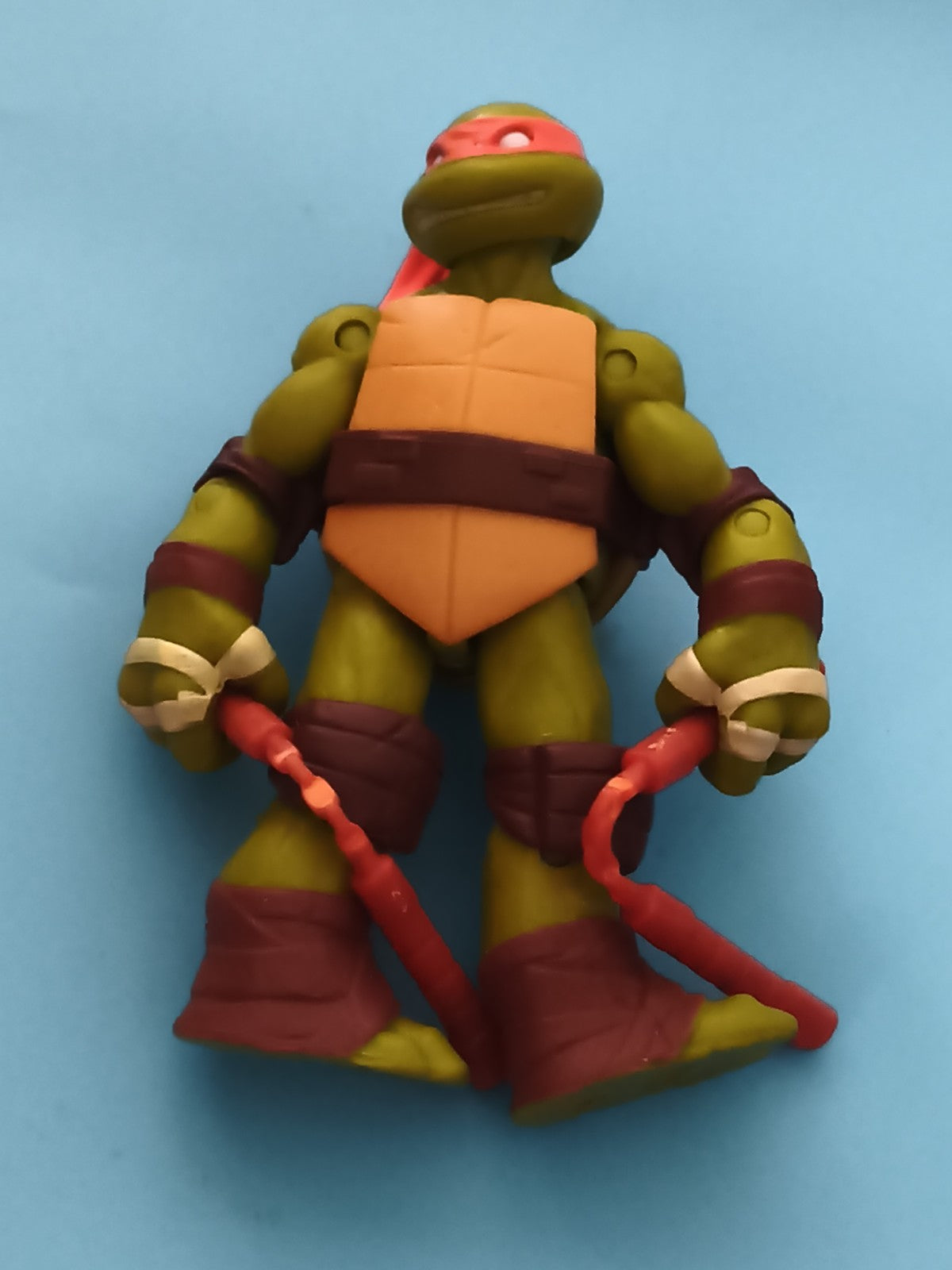 Figurine Tortue Ninja Raphael articulée bandeau rouge nunchaku TMNT jouet