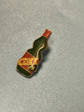 Vintage pin's bouteille GET 27 vert rouge collection publicitaire ancien