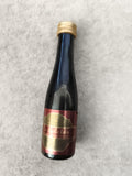 Mini bouteille alcool La Belle Idée liqueur apéritif capsule dorée partiellement