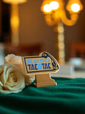 Pin's publicitaire vintage TACOTAC bleu doré rétro – accessoire rare années 90