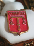 Broche blason Schirmeck émaillée rouge doré vintage, écusson ancien métal