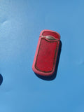 Ancien briquet publicitaire rouge en l'état, collection vintage rétro déco