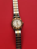 Montre Majestic quartz bracelet bicolore doré argenté femme pile à changer