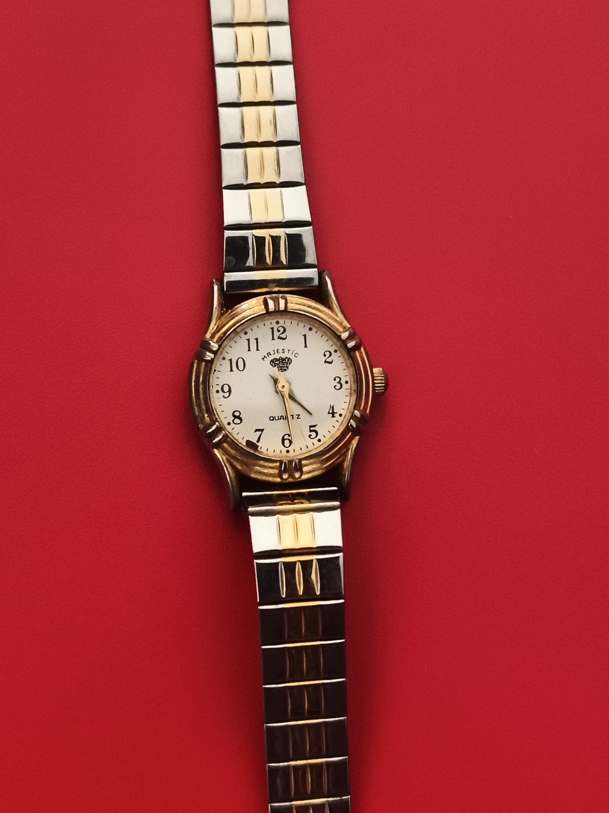 Montre Majestic quartz bracelet bicolore doré argenté femme pile à changer