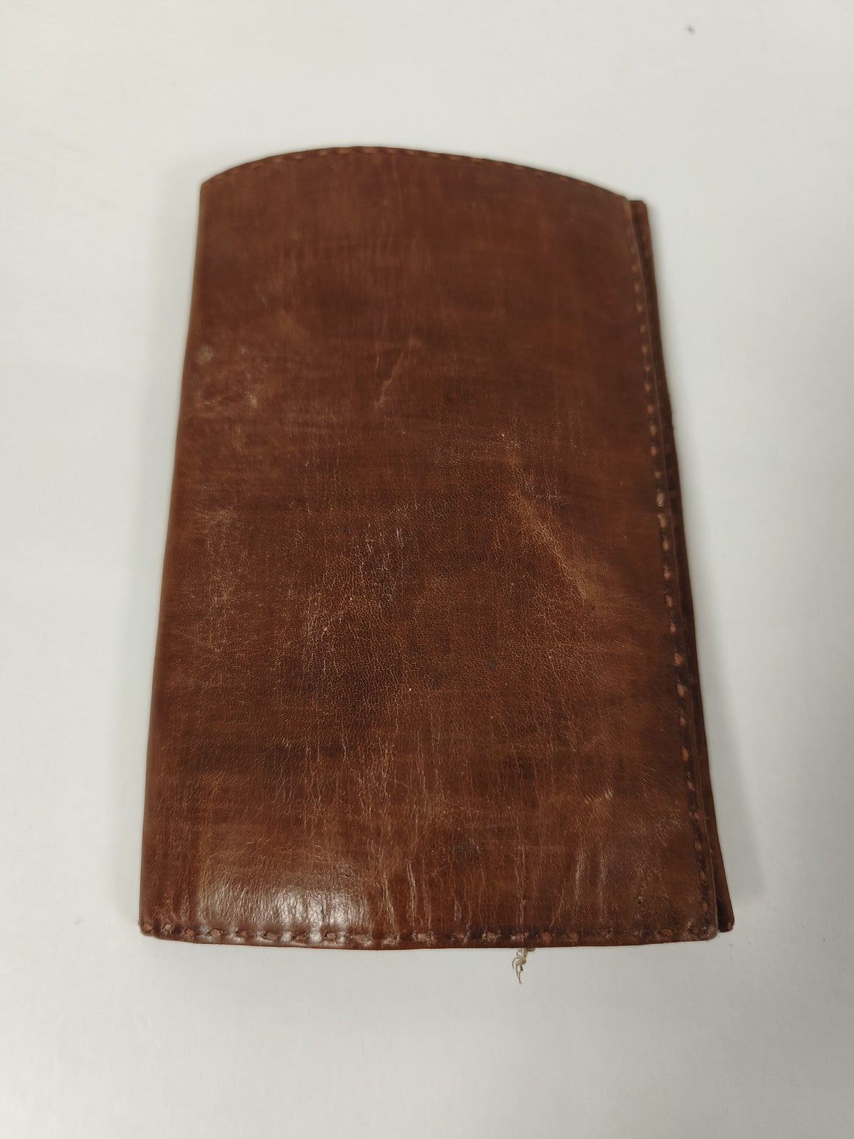 Ancien portefeuille en cuir marron Ancienne, vintage, authentique rétro