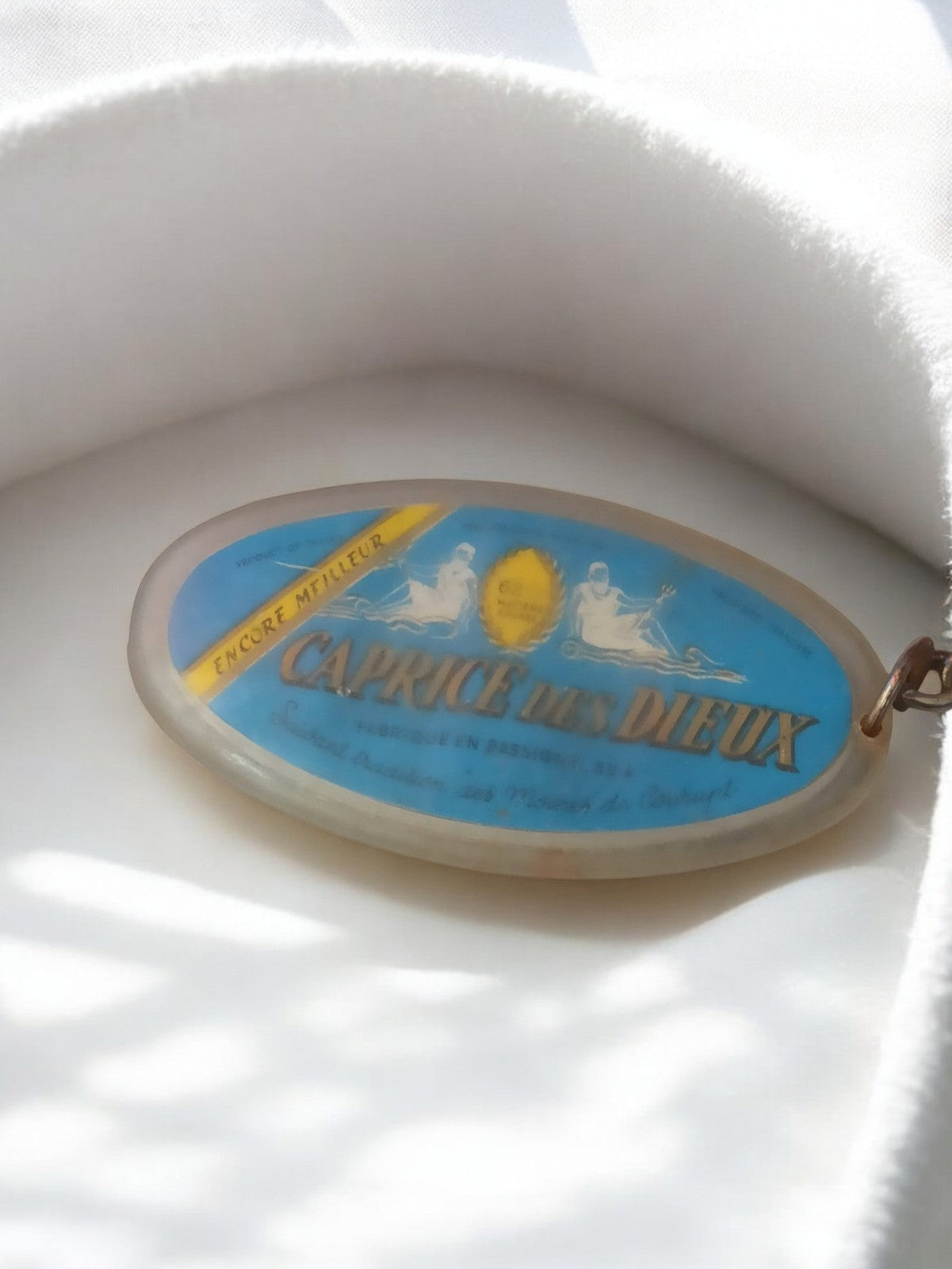 Porte-clés vintage Caprice des Dieux ancien ovale publicitaire rétro rare