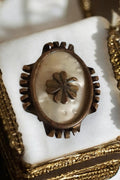 Broche ancienne vintage en nacre, trèfle à quatre feuilles, monture bronze