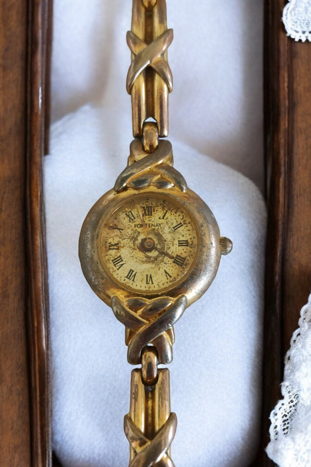 Montre femme Fontenay vintage dorée cadran romain bracelet motif tressé