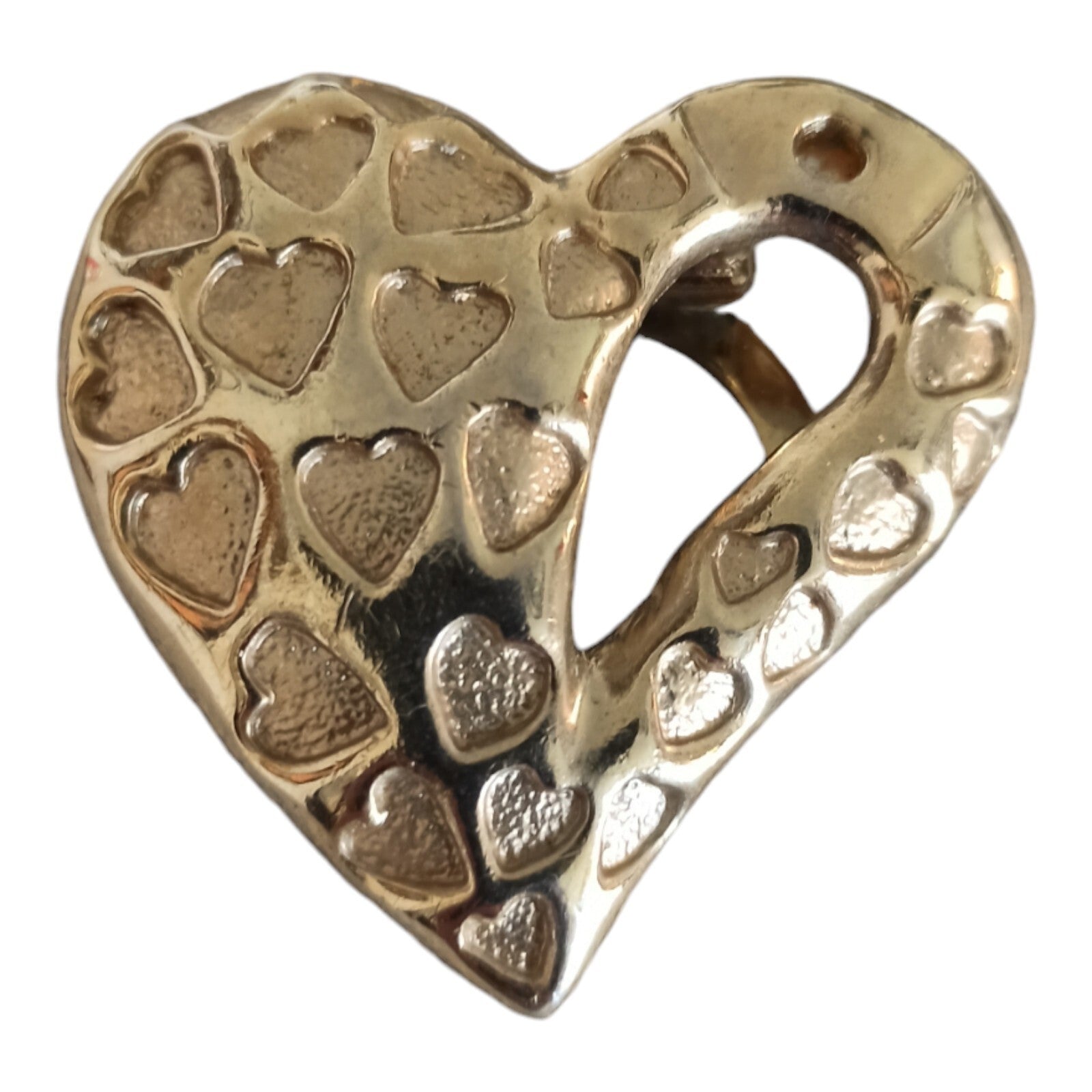 Vintage gold metal heart sculpture with small heart relief decoration, retro decorative item