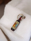 Porte-clés bouteille Artissol Muscat vintage ancien pub rétro rare