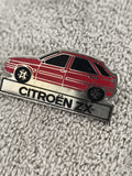 Pin's Citroën ZX vintage rouge, badge auto ancien, logo voiture années 90