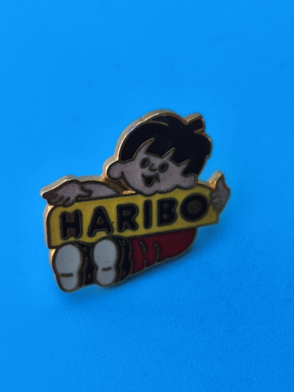 Vintage pin's Haribo enfant logo jaune rouge collection publicitaire rare
