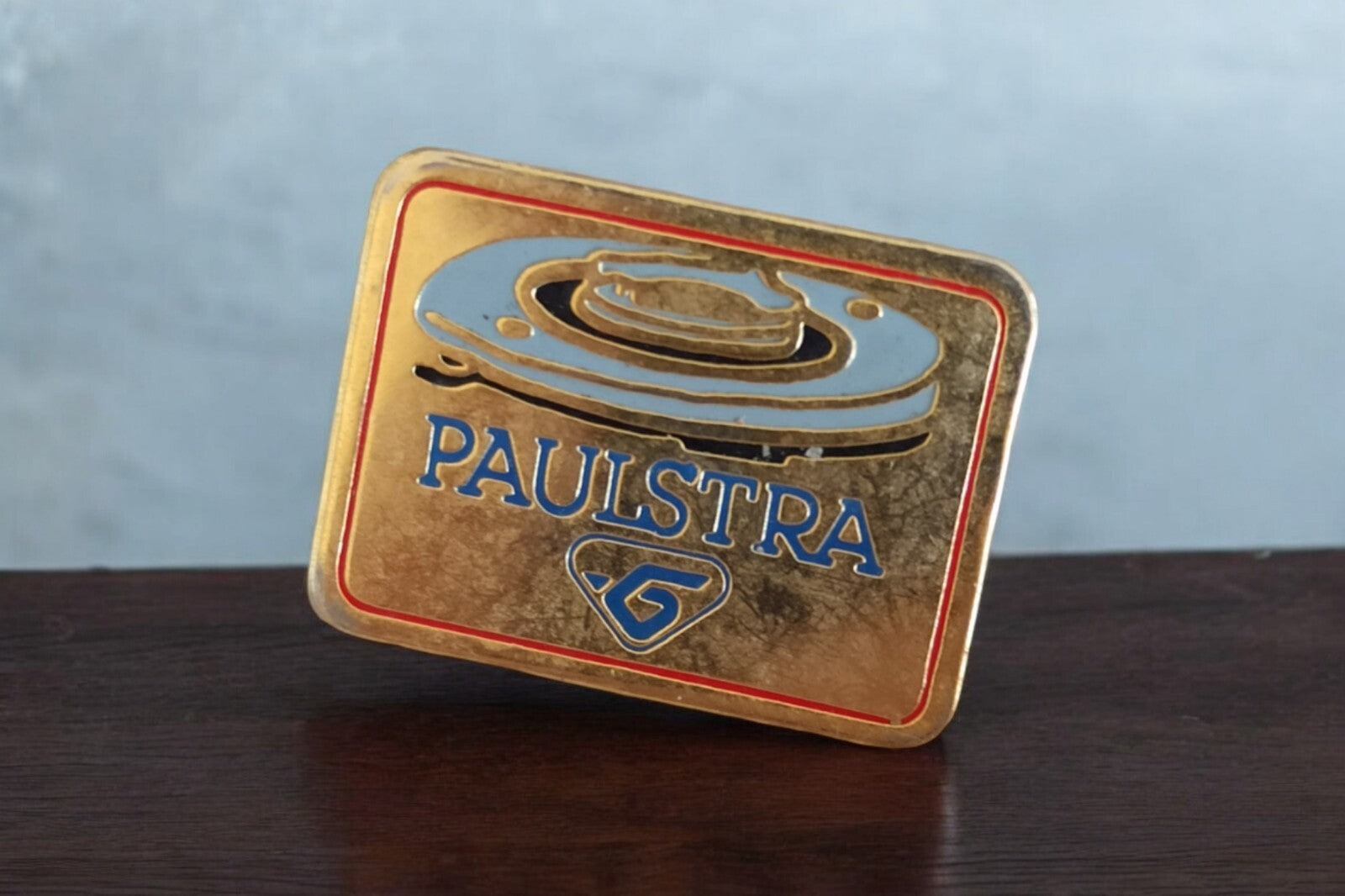 Pin's Paulstra vintage édition limitée doré logo bleu ancien badge