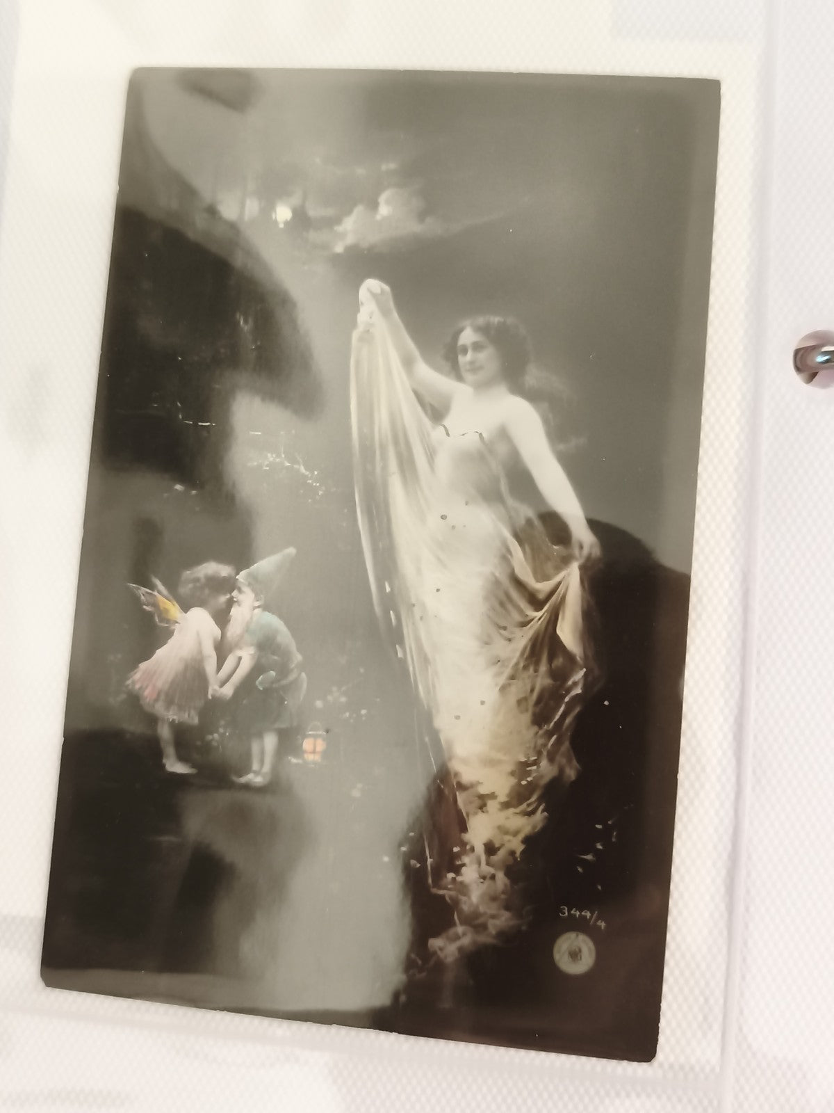 Carte postale ancienne CPA fée femme voilée effet photo début XXe féérie
