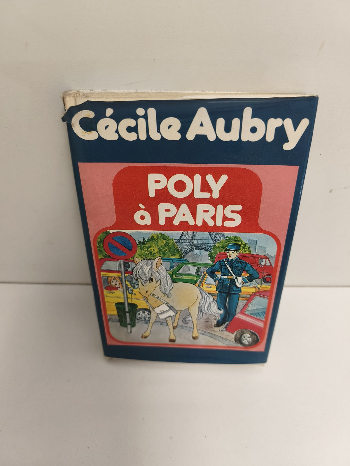 Livre ancien Poly à Paris Cécile Aubry édition vintage couverture illustrée