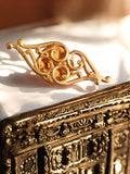 Broche vintage dorée motif ajouré arabesque style Art nouveau pin's rare