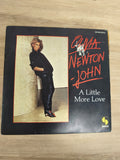 Vinyle 45 tours Olivia Newton-John ? A Little More Love pochette noire (Ref 1)