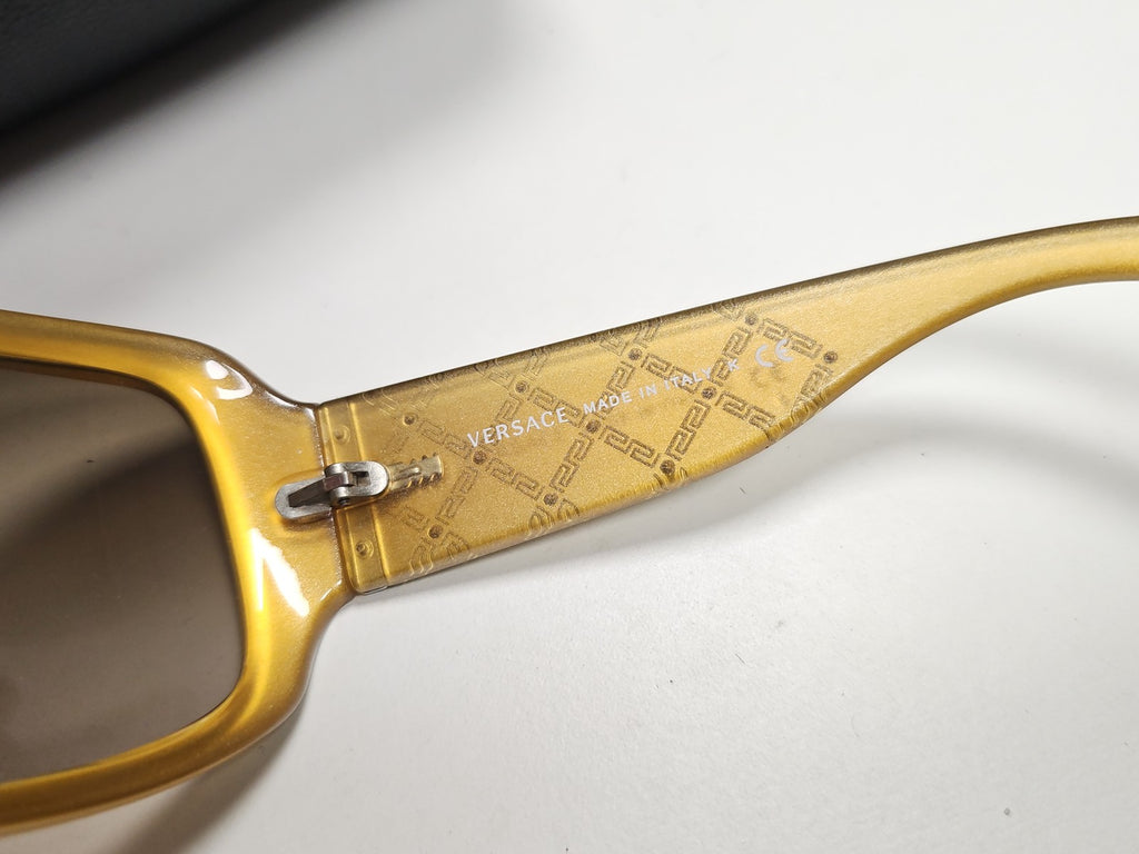 Lunettes de soleil femme Versace 4132-B, monture élégante, protection UV