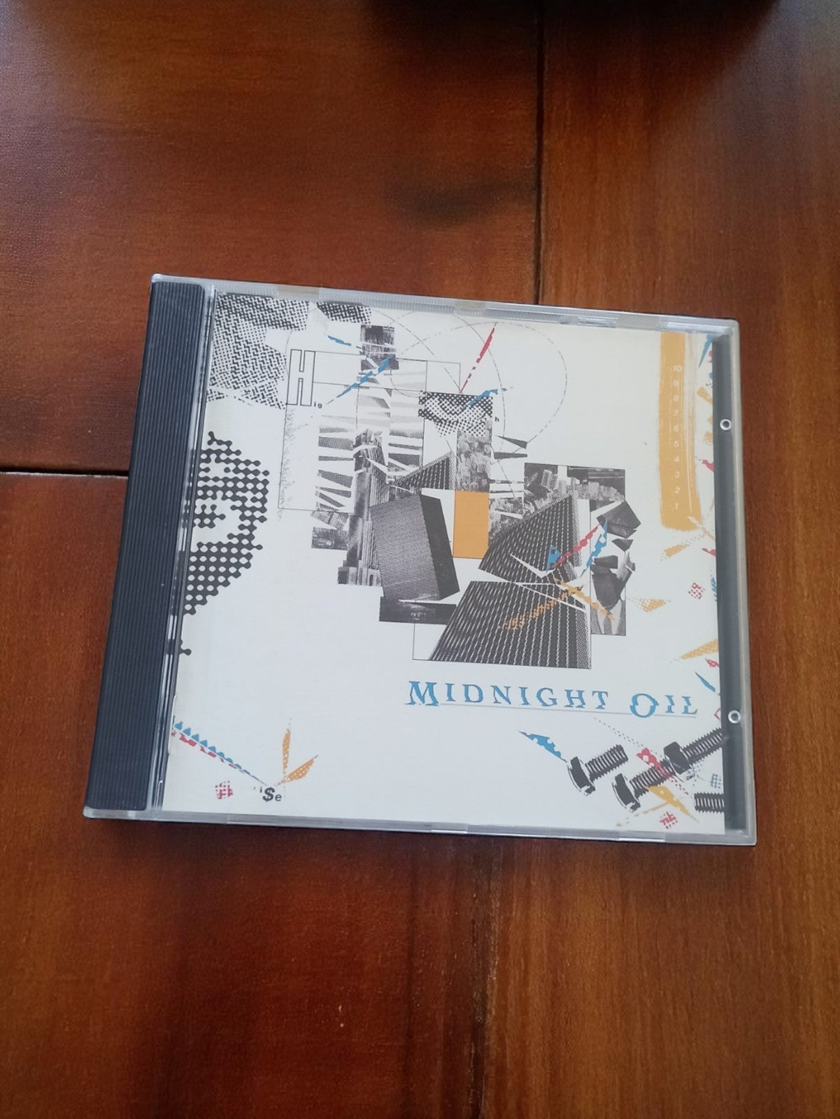 CD Midnight Oil – Album rock australien, boîtier cristal, pochette graphique