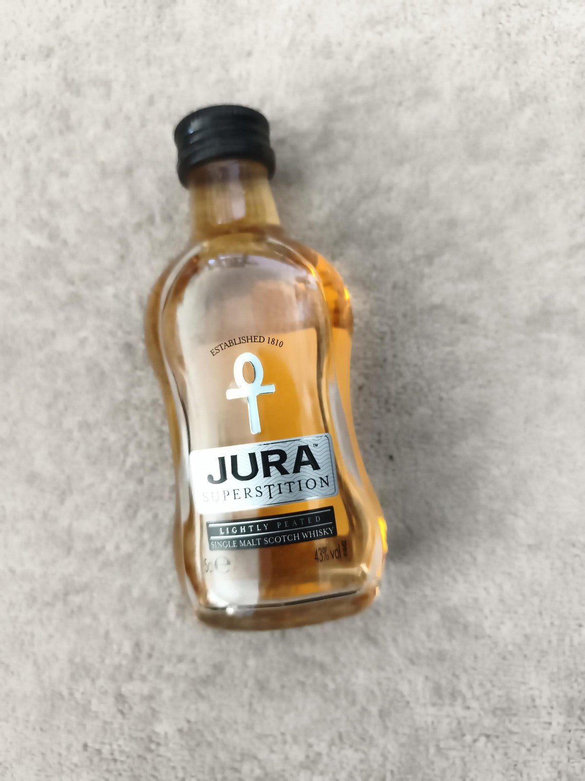 Miniature whisky Jura Superstition lightly peated partiellement remplie