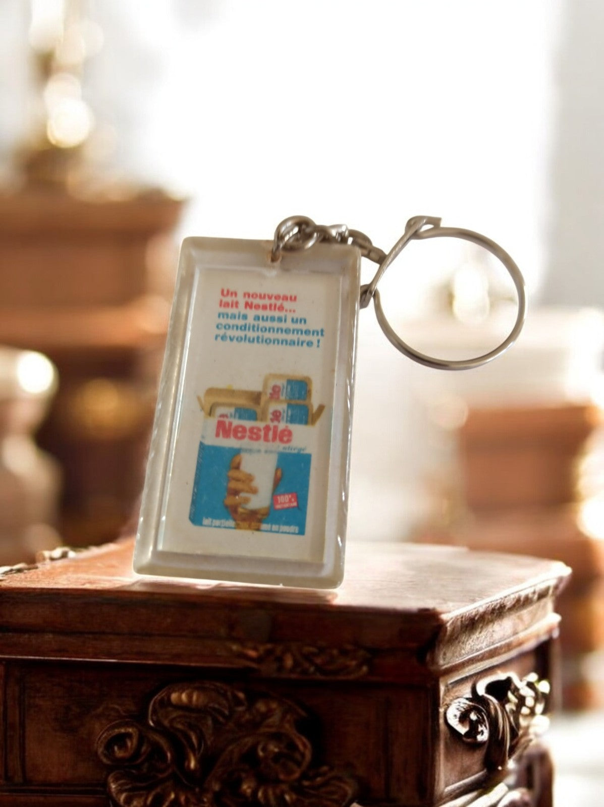 Porte-clés publicitaire Nestlé vintage France rectangulaire lait ancien