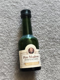 Mignonnette vintage Père Magloire Fine Calvados bouteille verte partiellement pl
