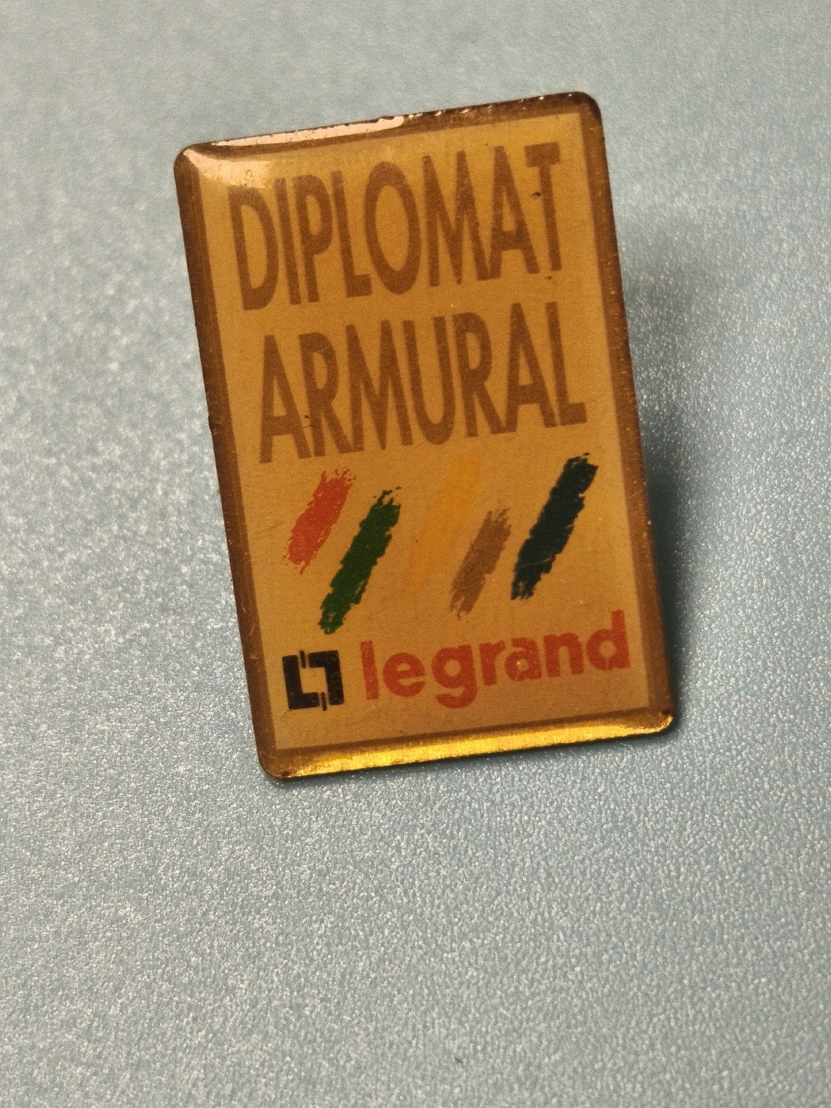 Vintage pin's publicitaire Diplomat Armural Legrand rectangulaire badge ancien