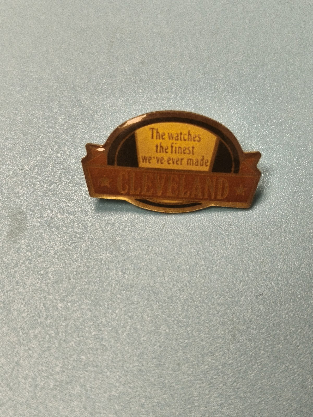 Vintage pin's Cleveland montre publicitaire rétro collection