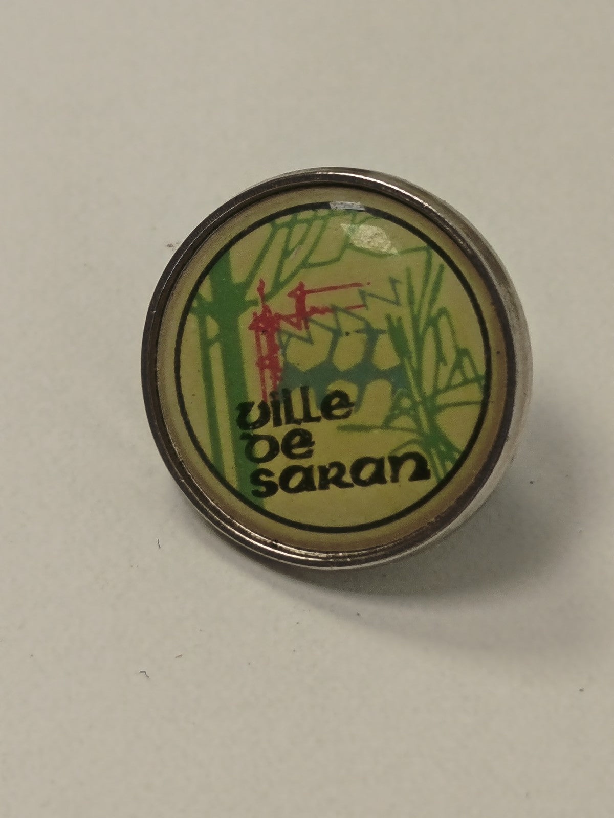 Pin's vintage ancien Saran, badge rétro ville française, collection souvenir rar